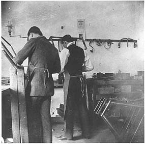 Orville at work in the Wright Cycle Company Shop.